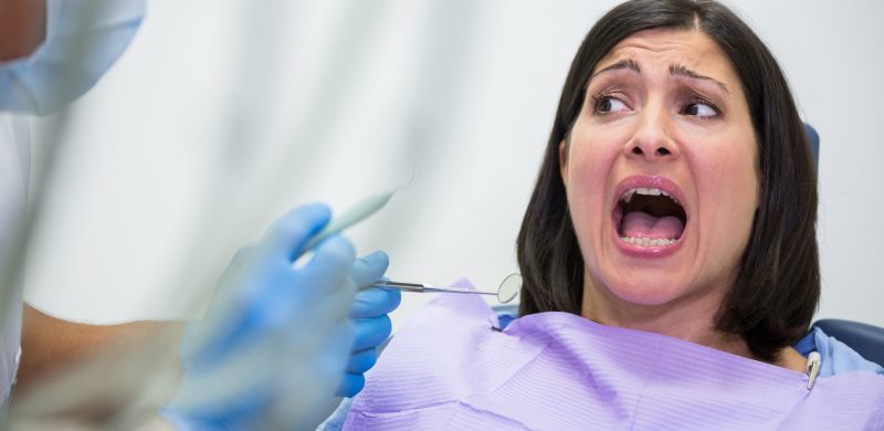 female-patient-scared-dental-check-up.jpg